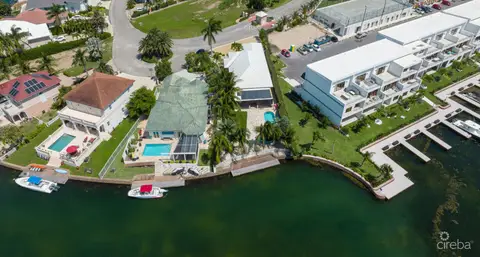 Gated Bimini Drive, Grand Harbour, Single Level 4 Bed Canal Front Home Reduced