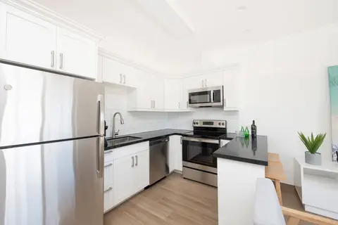 NEW MODERN BUILD WEST BAY CONDO