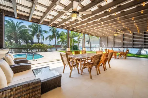 REDUCED: Bimini Drive 4 Bedroom Canal Front Home.