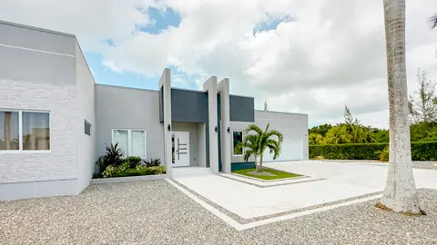 PRICE IMPROVEMENT! 4 Bedroom Tarpon Circle Family Home