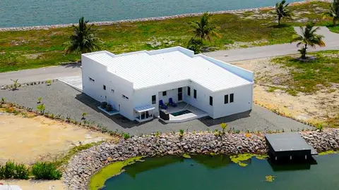 THE CHANNELS CANAL FRONT HOME - NEW CONSTRUCTION! PRICE REDUCED!