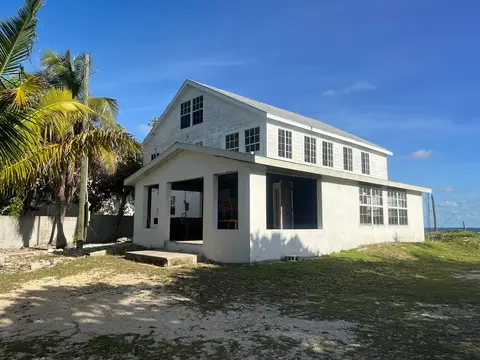 Reduced $150,000! Oceanfront Three Story 4/2 + 1/1.5!
