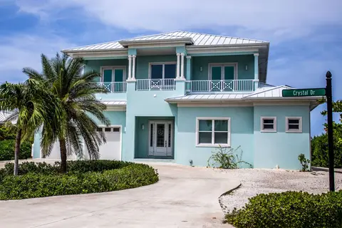 Crystal Harbour Luxury 5BR/6BA Canal Front Home