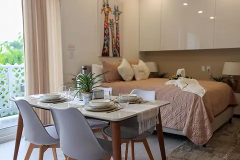 Studio apartment at The Grove for long-term rental, steps from Seven Mile Beach