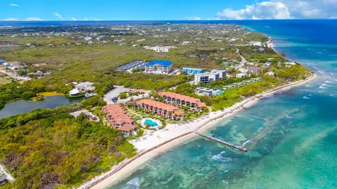 (Sale Pending) CENTURY 21 | BEACH FRONT ONE BED CONDO IN WEST BAY - 22 VILLA PAPPAGALLO