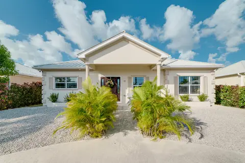 (Sale Pending) CENTURY 21 | COCONUT VILLAGE HOME