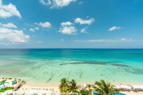 FOR RENT: 3 Bed Beach Front Condo on Seven Mile Beach